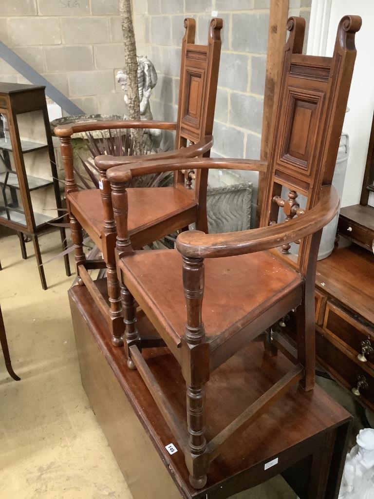 A pair of late Victorian walnut elbow chairs, width 60cm, depth 46cm, height 106cm